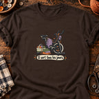 Vélo d’appartement et tricot Il sert tous les jours. — T-shirt chocolat